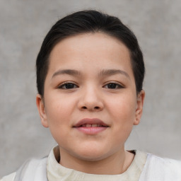 Joyful white child female with short  brown hair and brown eyes