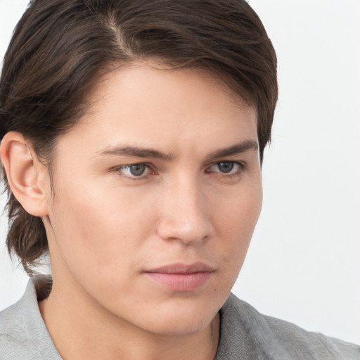 Neutral white young-adult male with medium  brown hair and brown eyes