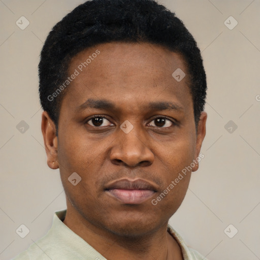 Neutral black young-adult male with short  black hair and brown eyes