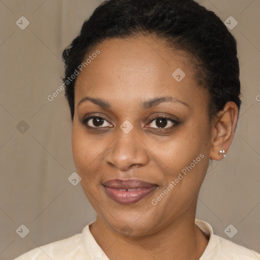 Joyful black adult female with short  brown hair and brown eyes