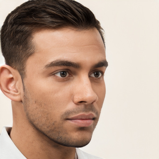 Neutral white young-adult male with short  brown hair and brown eyes