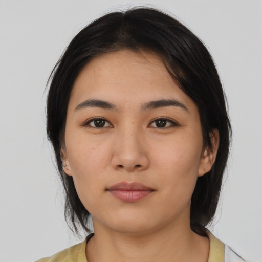 Neutral asian young-adult female with medium  black hair and brown eyes