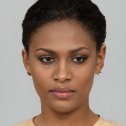 Neutral black young-adult female with short  brown hair and brown eyes