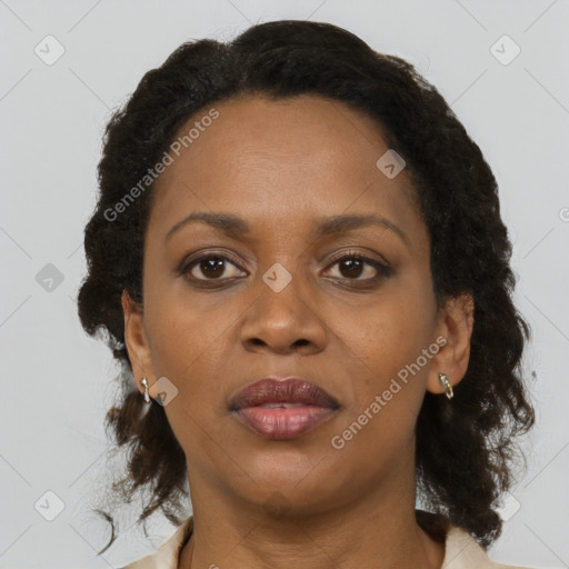 Neutral black adult female with medium  brown hair and brown eyes