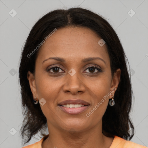 Joyful latino young-adult female with medium  brown hair and brown eyes