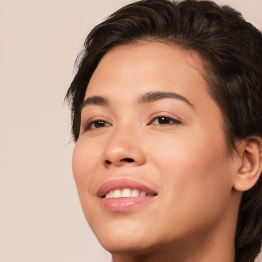 Joyful white young-adult female with medium  brown hair and brown eyes