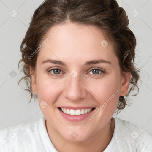 Joyful white young-adult female with medium  brown hair and blue eyes