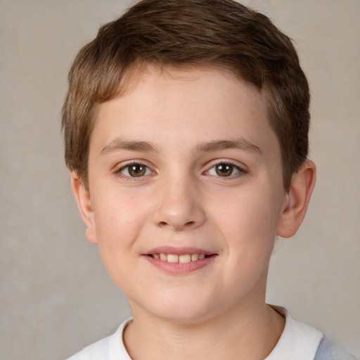 Joyful white child male with short  brown hair and brown eyes