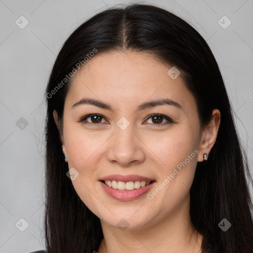 Joyful white young-adult female with long  brown hair and brown eyes