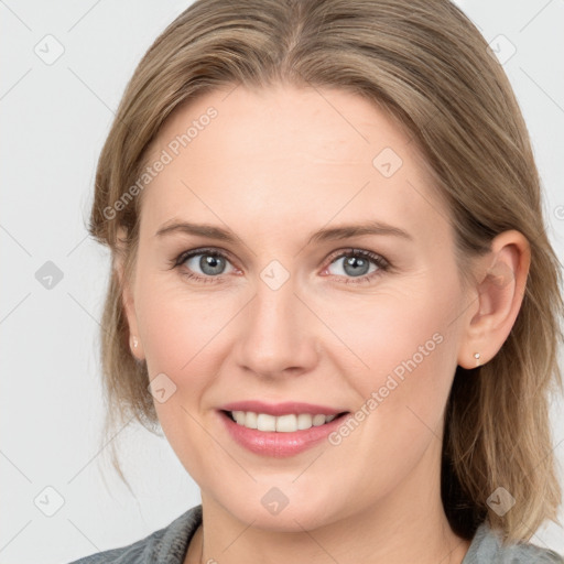 Joyful white young-adult female with medium  brown hair and blue eyes