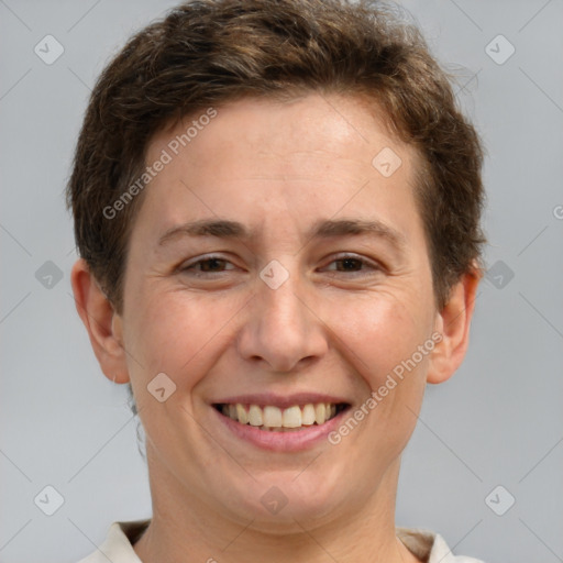 Joyful white adult female with short  brown hair and brown eyes