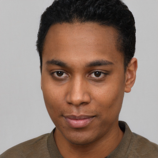 Neutral black young-adult male with short  black hair and brown eyes