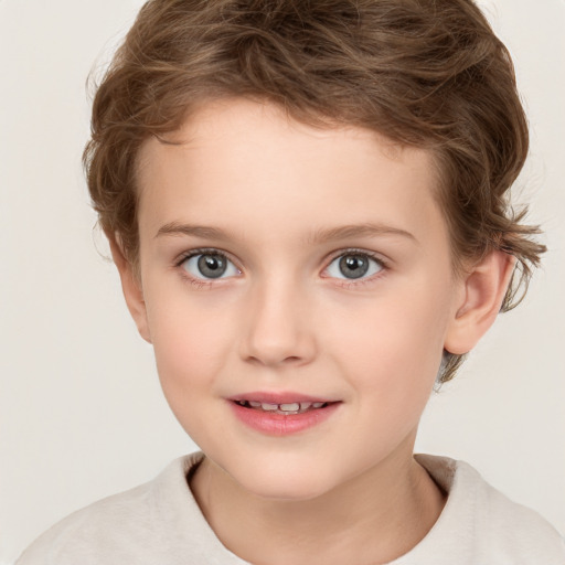 Joyful white child female with short  brown hair and brown eyes