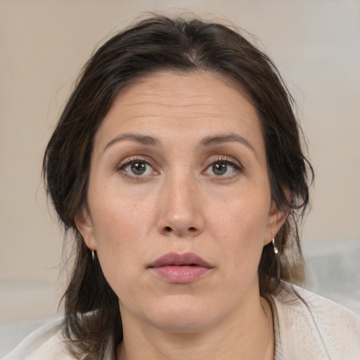 Neutral white adult female with medium  brown hair and brown eyes