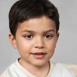 Joyful white child male with short  brown hair and brown eyes