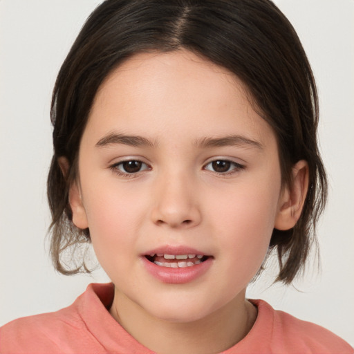 Joyful white child female with medium  brown hair and brown eyes