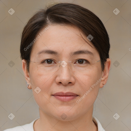 Joyful white adult female with short  brown hair and brown eyes