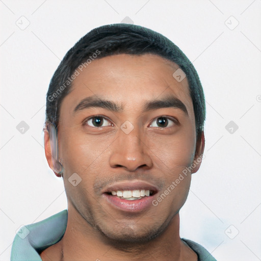 Joyful white young-adult male with short  black hair and brown eyes