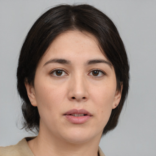 Neutral white young-adult female with medium  brown hair and brown eyes