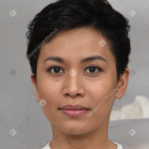 Joyful asian young-adult female with short  black hair and brown eyes