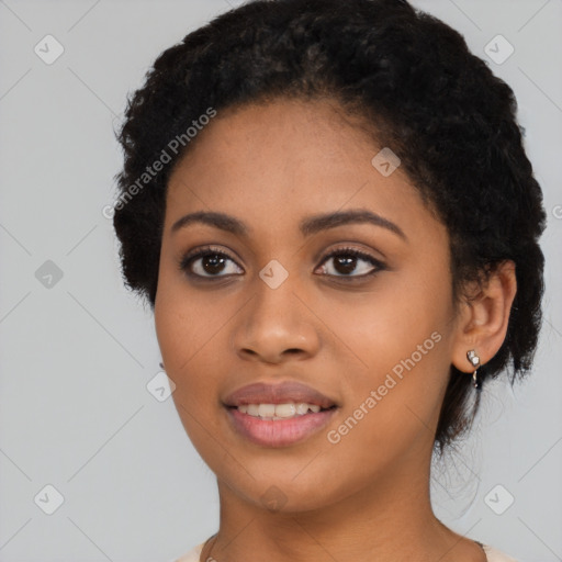 Joyful latino young-adult female with short  black hair and brown eyes