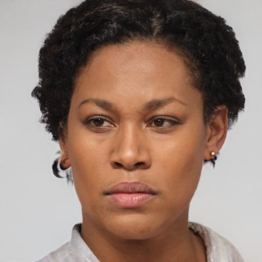 Neutral black young-adult female with short  brown hair and brown eyes