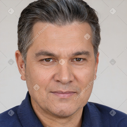 Joyful white adult male with short  brown hair and brown eyes