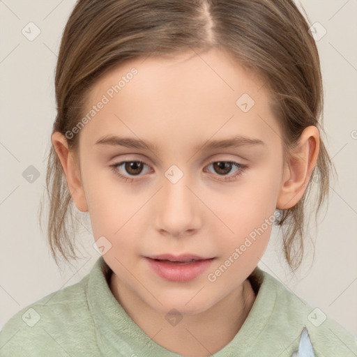 Joyful white child female with medium  brown hair and brown eyes