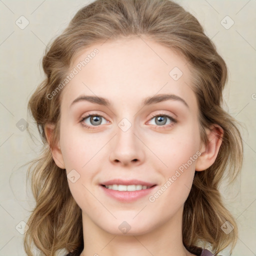 Joyful white young-adult female with medium  brown hair and blue eyes