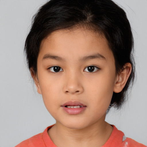 Neutral asian child female with medium  brown hair and brown eyes