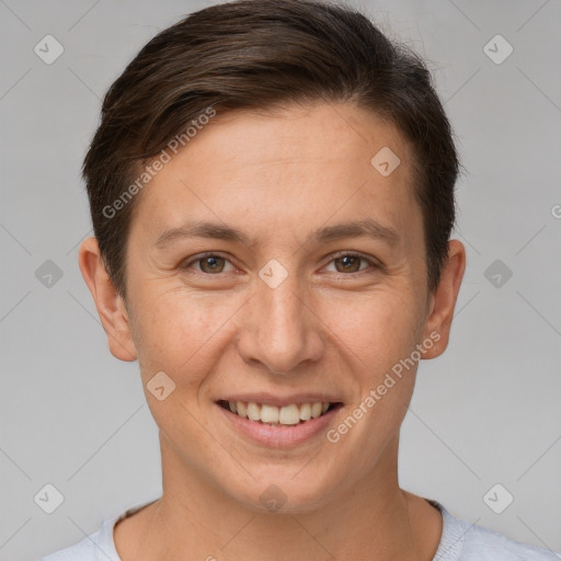 Joyful white adult female with short  brown hair and brown eyes