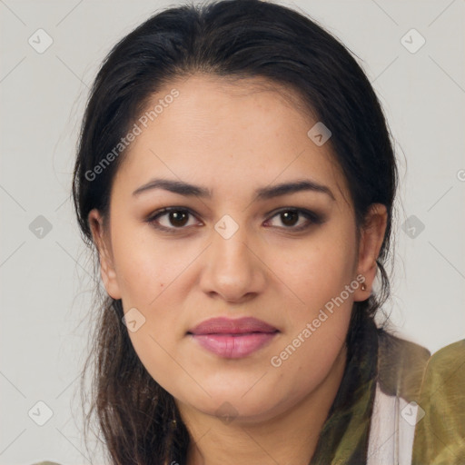 Joyful latino young-adult female with medium  brown hair and brown eyes