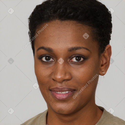 Joyful black young-adult female with short  brown hair and brown eyes