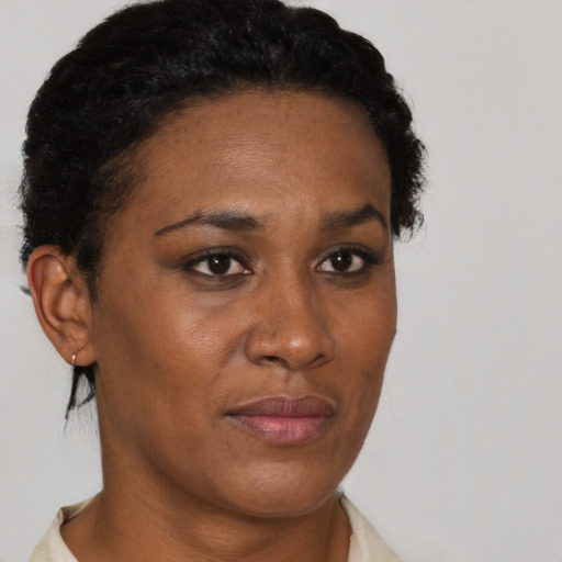 Neutral black young-adult female with short  black hair and brown eyes