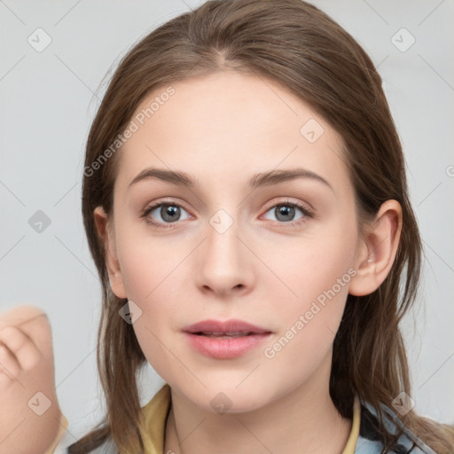 Neutral white young-adult female with medium  brown hair and grey eyes