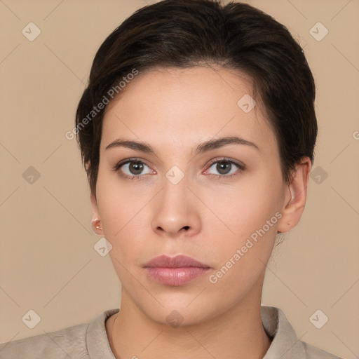 Neutral white young-adult female with short  brown hair and brown eyes