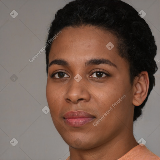 Joyful latino young-adult female with short  black hair and brown eyes