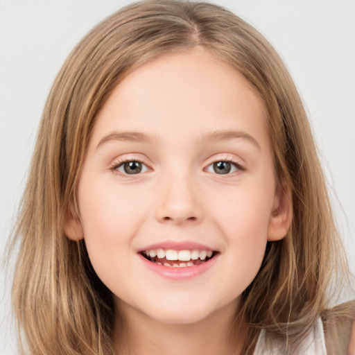 Joyful white child female with medium  brown hair and brown eyes