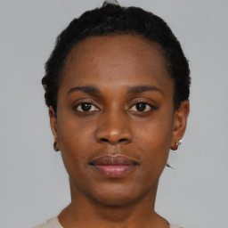 Neutral black young-adult female with short  black hair and brown eyes