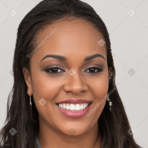 Joyful latino young-adult female with long  brown hair and brown eyes