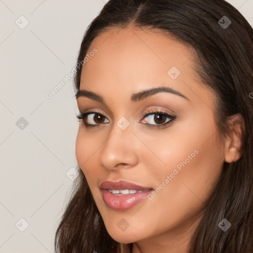 Joyful latino young-adult female with long  brown hair and brown eyes