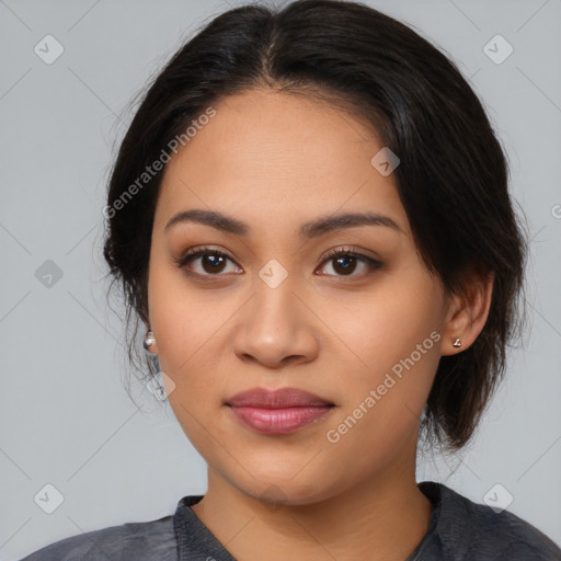 Joyful latino young-adult female with medium  black hair and brown eyes