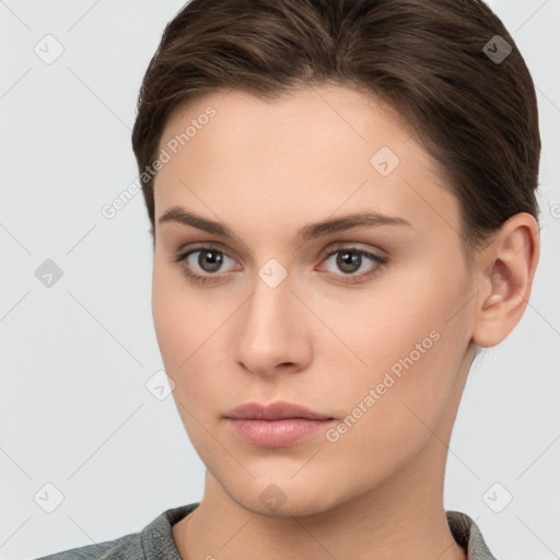 Neutral white young-adult female with short  brown hair and brown eyes