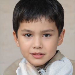 Joyful white child male with short  brown hair and brown eyes