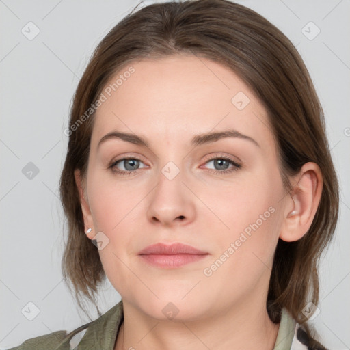 Neutral white young-adult female with medium  brown hair and grey eyes