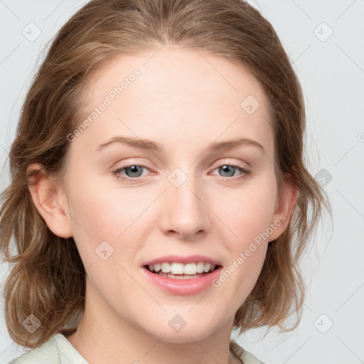 Joyful white young-adult female with medium  brown hair and blue eyes