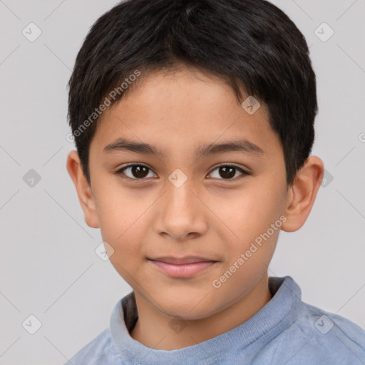 Joyful white child male with short  brown hair and brown eyes