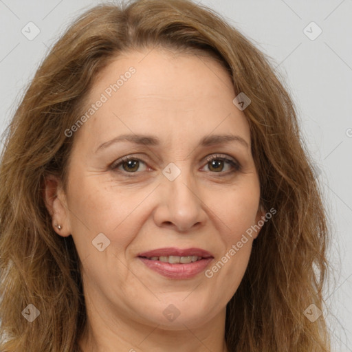 Joyful white adult female with long  brown hair and brown eyes