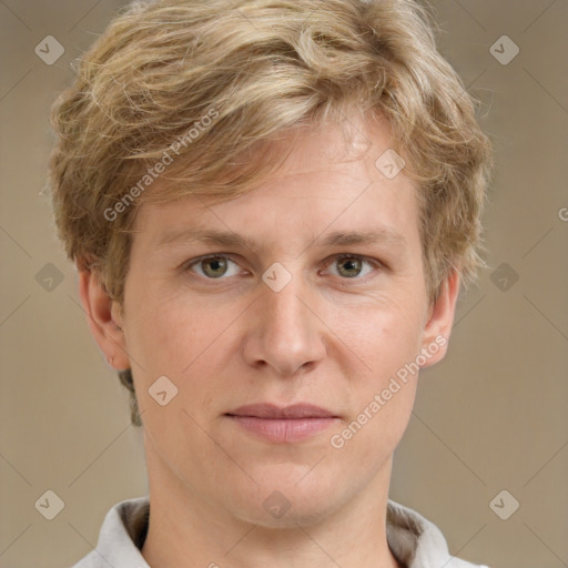 Joyful white adult male with short  brown hair and grey eyes