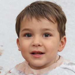 Joyful white child male with short  brown hair and brown eyes